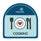 Plate with heart at the center with fork, knife, and spoon on the sides.