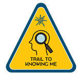 Silhouette of person with a profile view, magnifying glass on top.